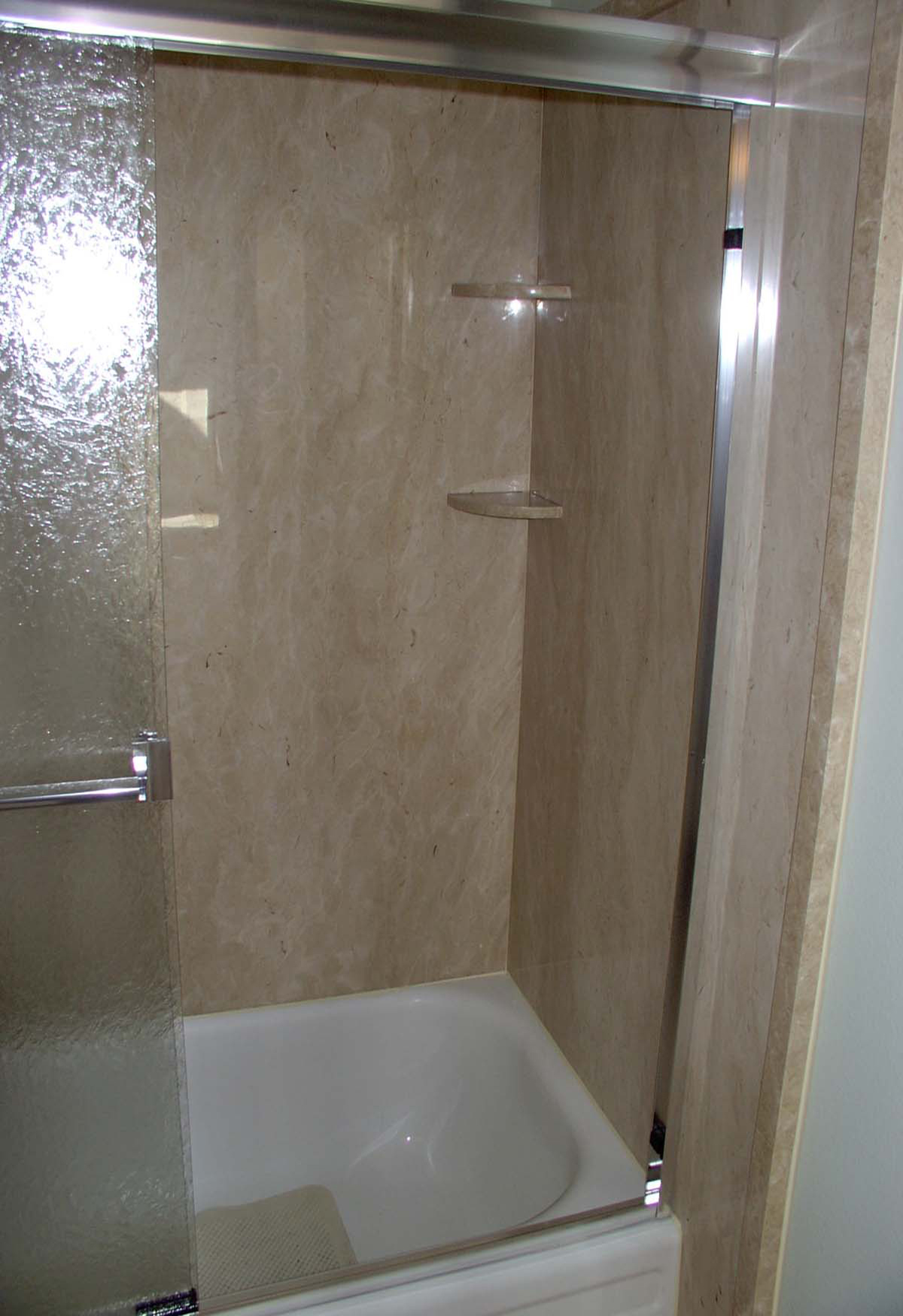 Marble Shower Surround Remodel with trim piece